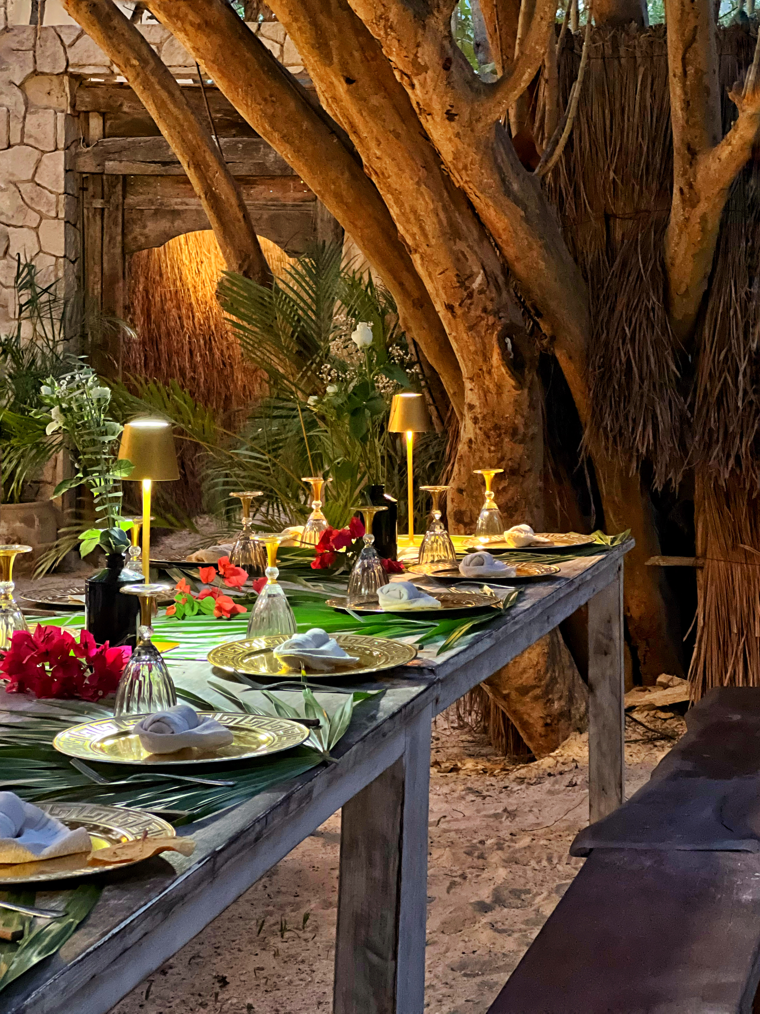 Candlelit jungle dinner table at Chi Ka Amansala Tulum